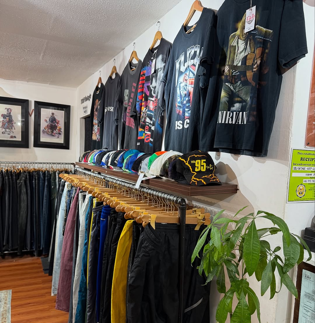 Nirvana and graphic tees on store rack